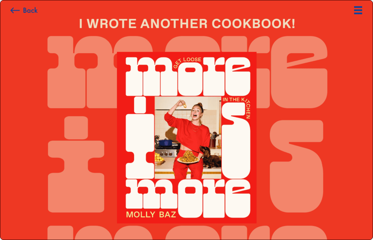 A cookbook cover features a person in a red outfit holding pasta, with the title "More Is More: Get Loose in the Kitchen" by Molly Baz, on a bold orange background. | Wonderly