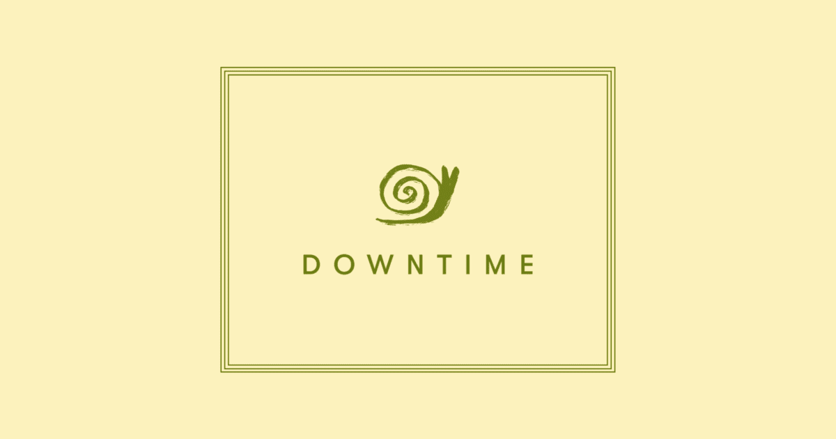 A green spiral snail above the word "DOWNTIME" is centered in a double-lined rectangular border on a pale yellow background. | Wonderly