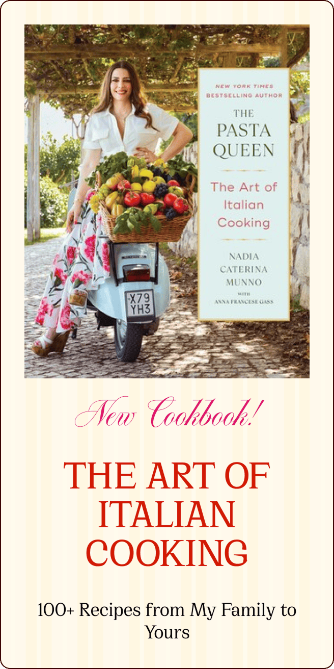 A woman sits on a blue scooter holding a basket of vegetables next to a large image of the cookbook "The Art of Italian Cooking" by Nadia Caterina Munno. | Wonderly